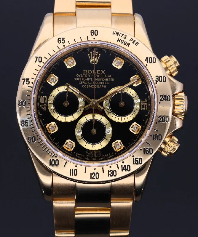 watch with blue dial -  Rolex Daytona 16528 40mm Gold Watch